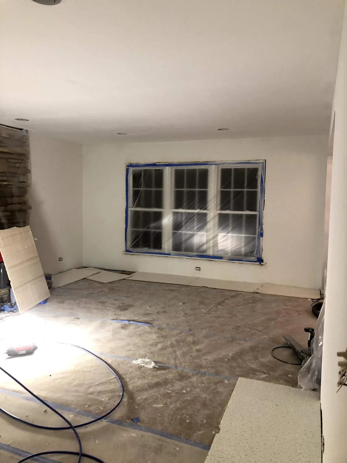 Drywall repair and surface prep in progress before interior painting on a Chicagoland remodel