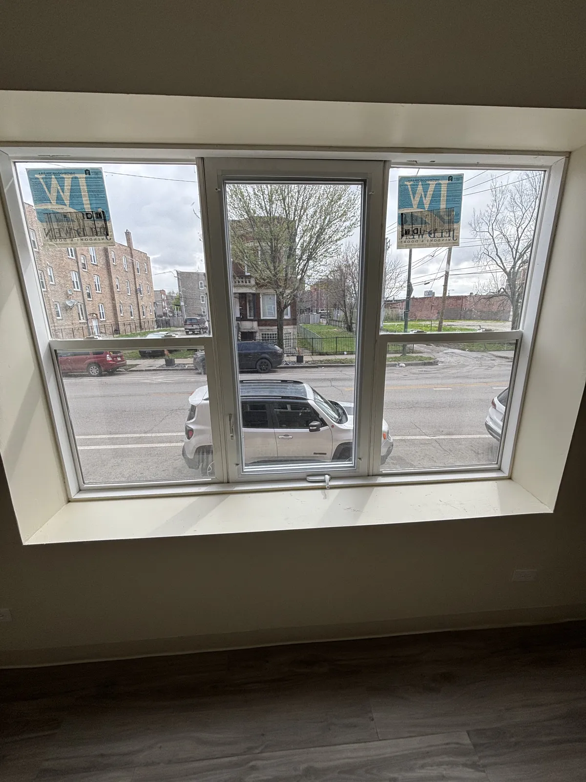 Window replacement underway on a Chicago residential building